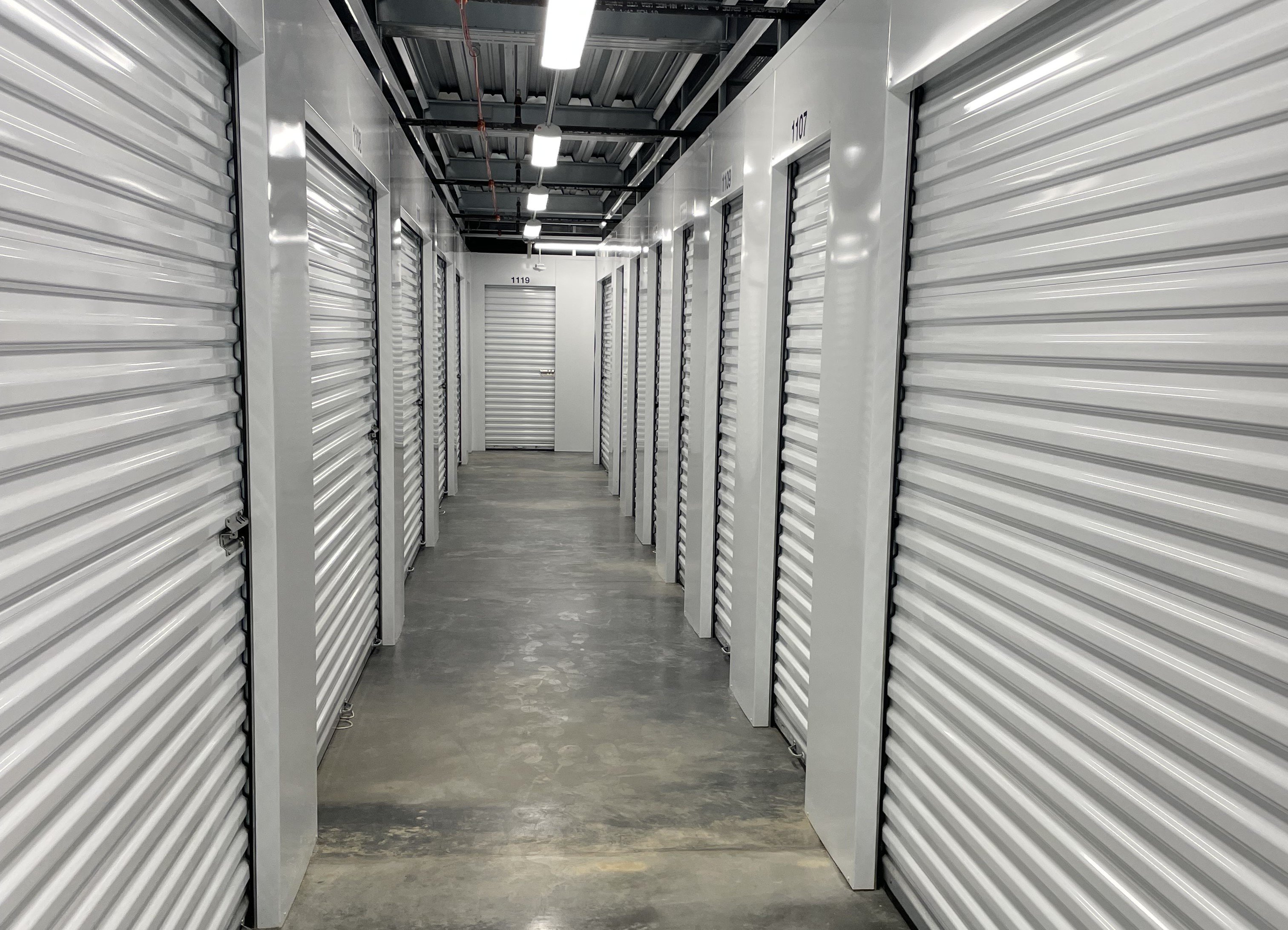 A spotless interior hallway with Stone Spring rolling doors