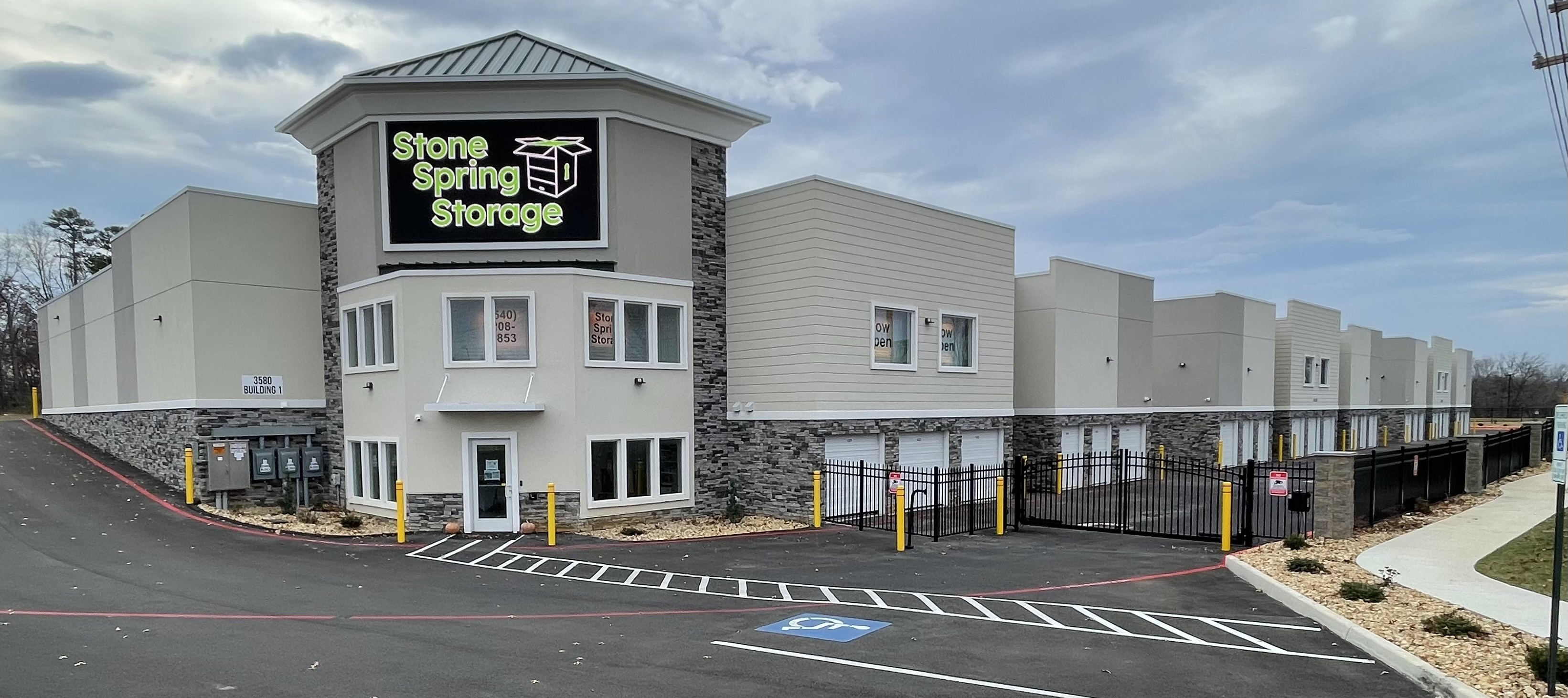 Stone Spring Storage exterior with the brand logo on the LED sign